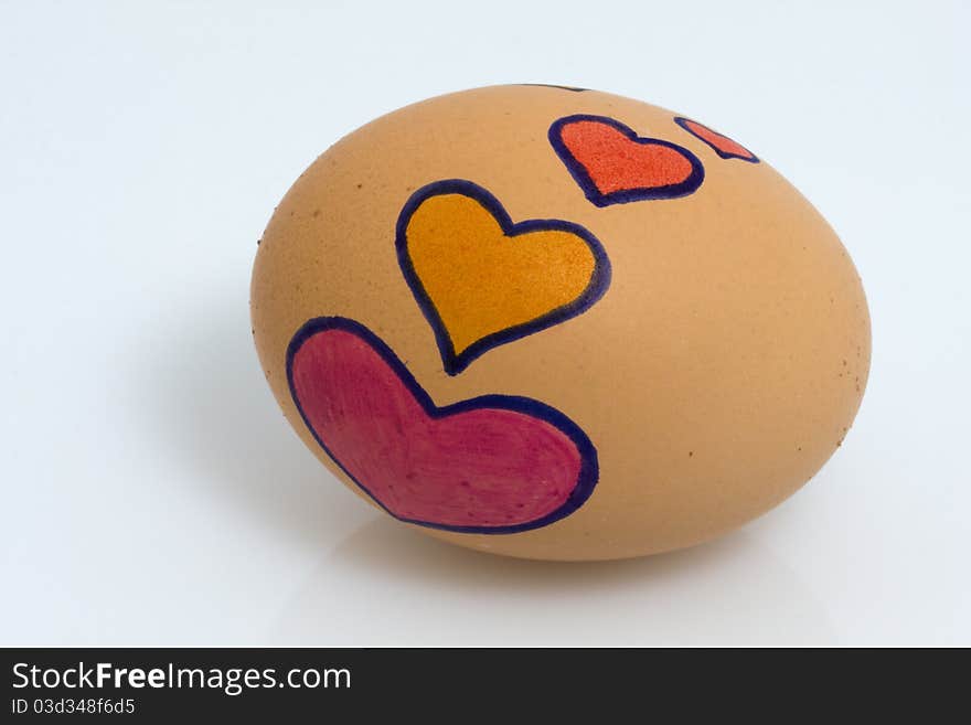 Egg with some hearts drawn. Egg with some hearts drawn