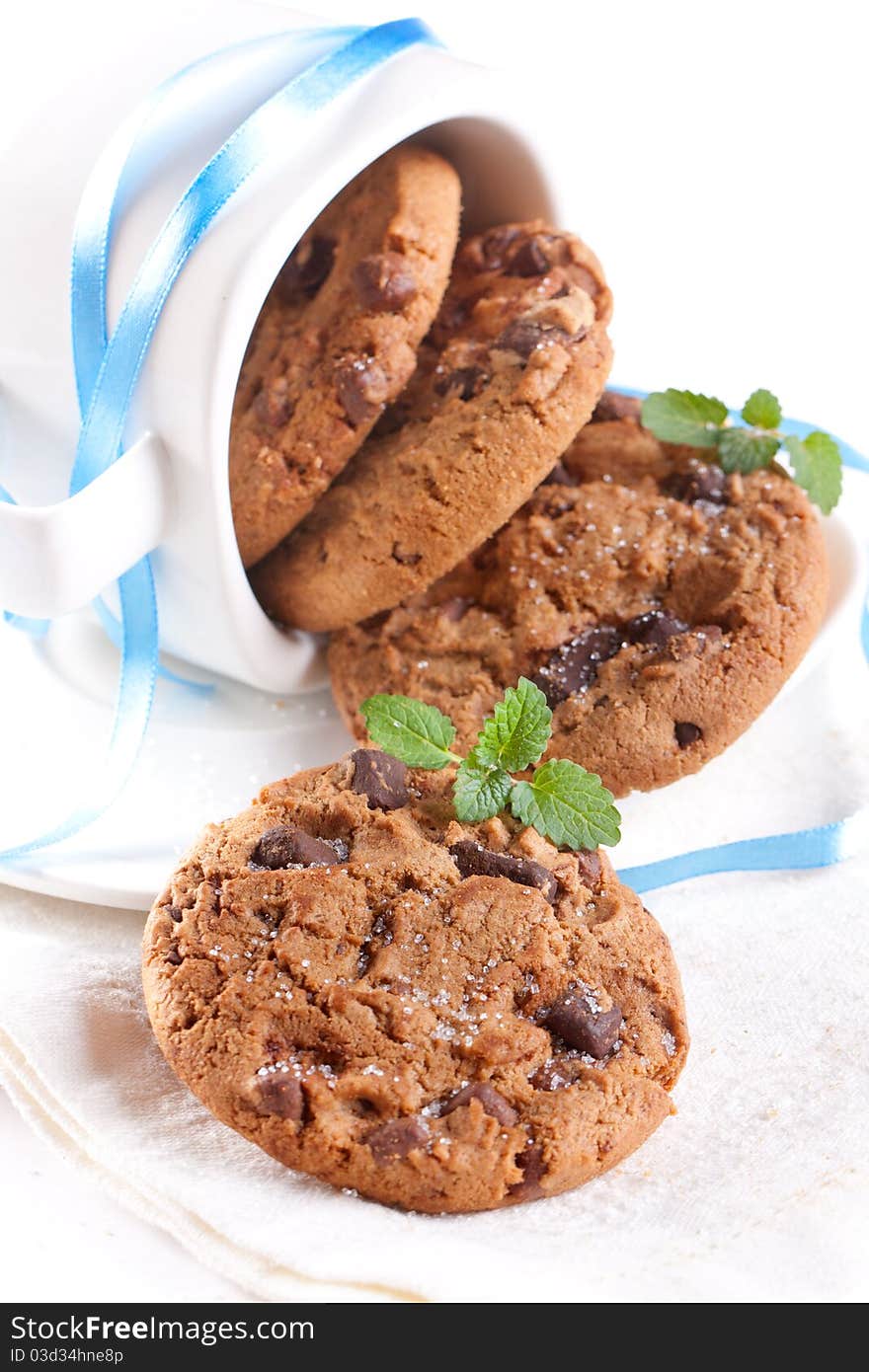 Chocolate chip cookies on white plate