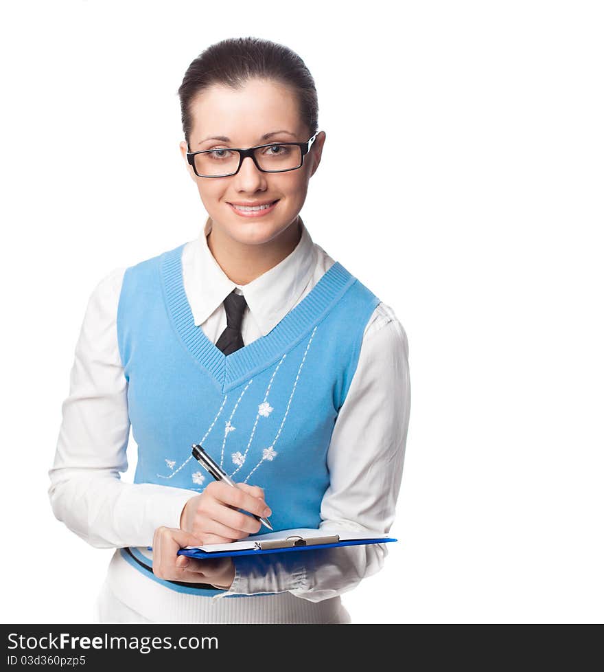 Happy student wearing the glasses and west with pen on a white background looking streight