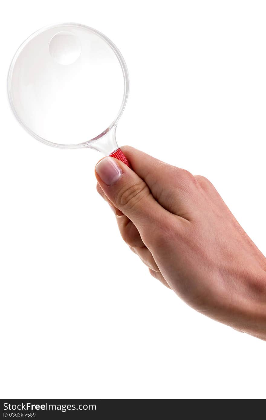 Female Hand Holding A Magnifying Glass