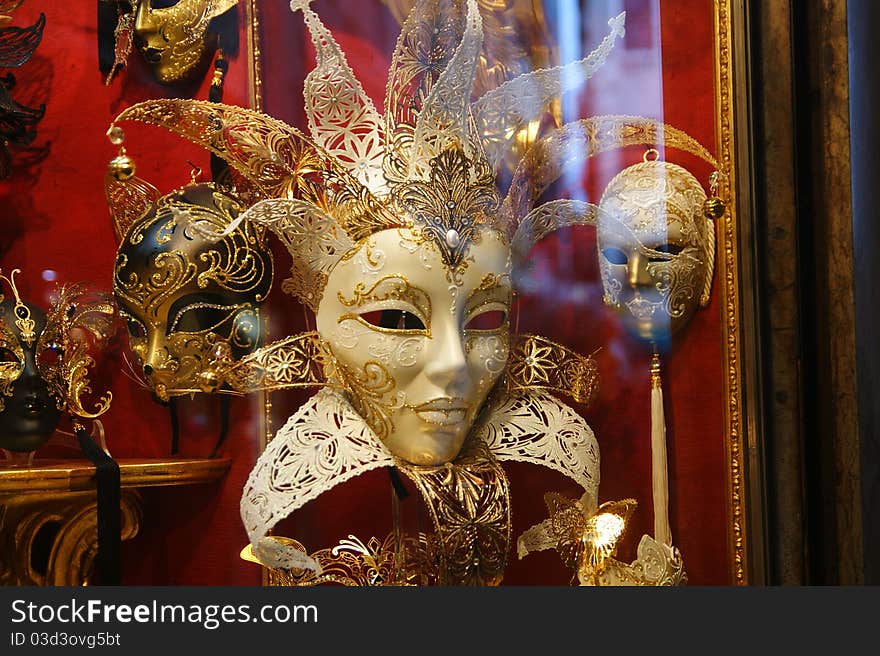 Golden mask in the shopping window. Golden mask in the shopping window