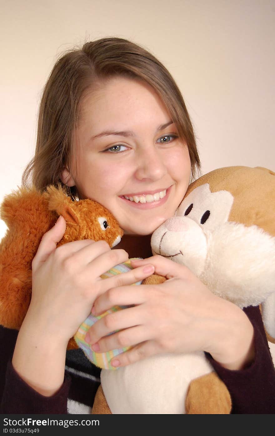 Teenager in the brindled pullover with her animals. Teenager in the brindled pullover with her animals