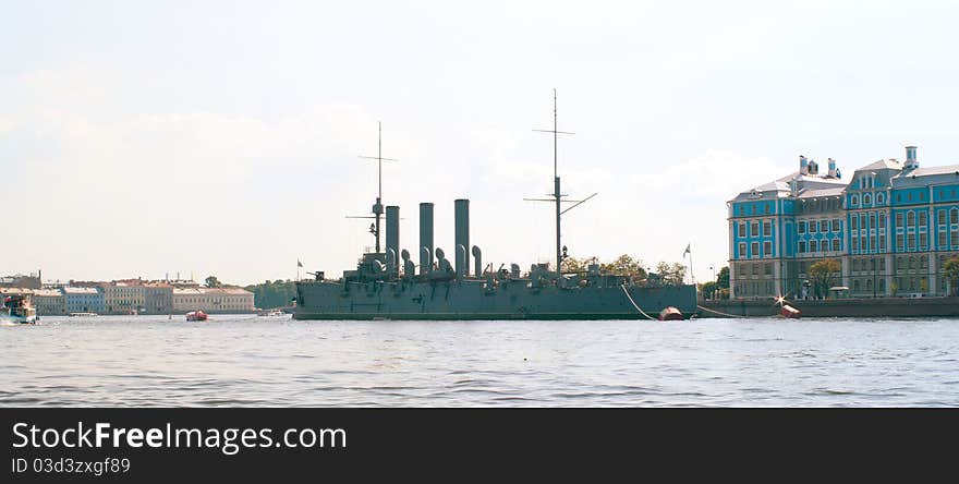 Walking boats and Aurora Cruiser on the river Neva. St.-Petersburg, Russia. Shallow DOF