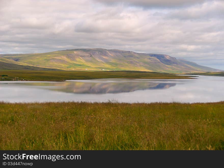 Reflections on the lake in the peninsula of Vatnsness. Reflections on the lake in the peninsula of Vatnsness