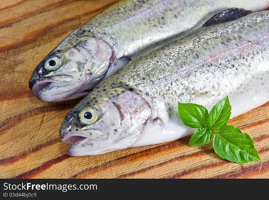 Fresh trout on wood table