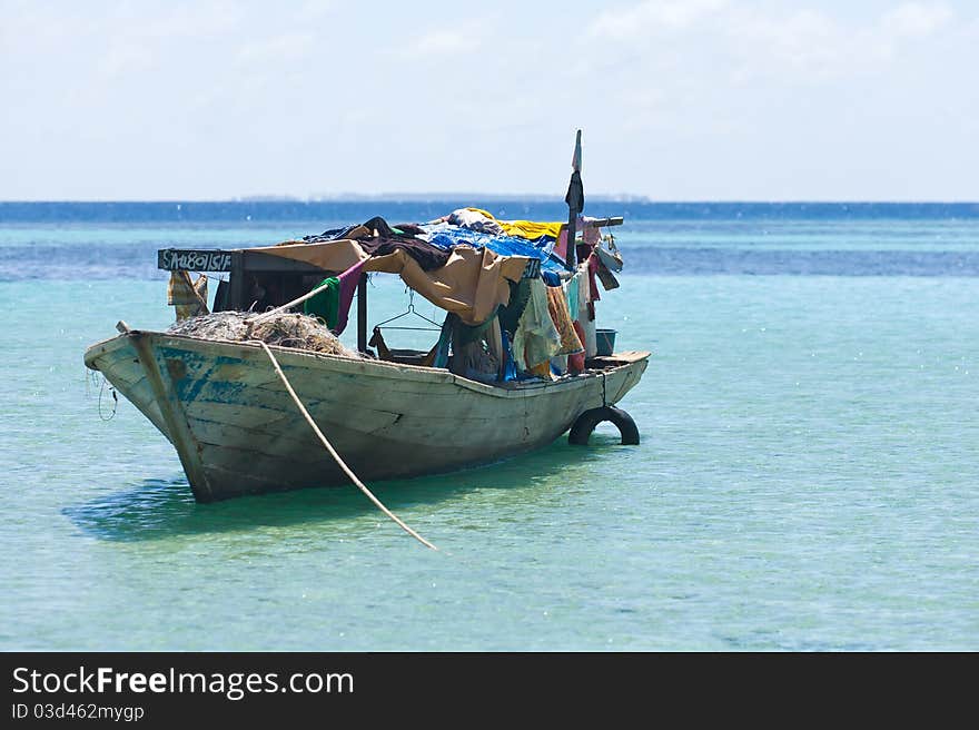 Small boat used as a house by the Sea Gypsies. Small boat used as a house by the Sea Gypsies