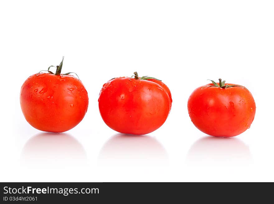 Red tomato vegetable fruits isolated on the white background