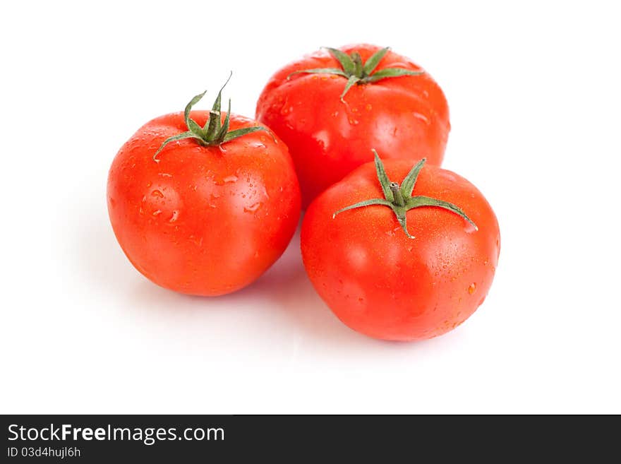 Red tomato vegetable fruits isolated on the white background