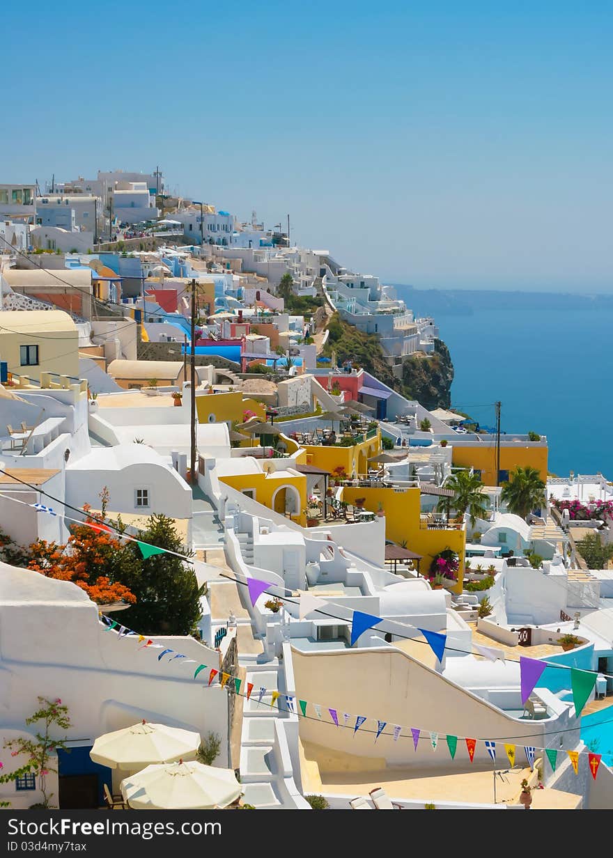 Classic view of Oia on island of Santorini in Greece. Traditional architecture with famous white houses. Classic view of Oia on island of Santorini in Greece. Traditional architecture with famous white houses.