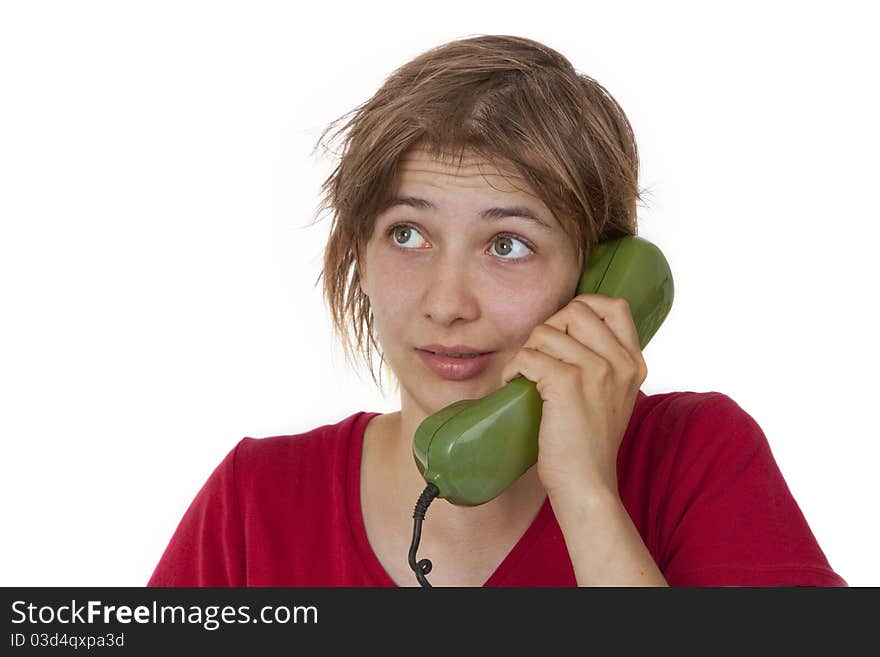 Young woman talking on telephone - isolated on white background. Young woman talking on telephone - isolated on white background