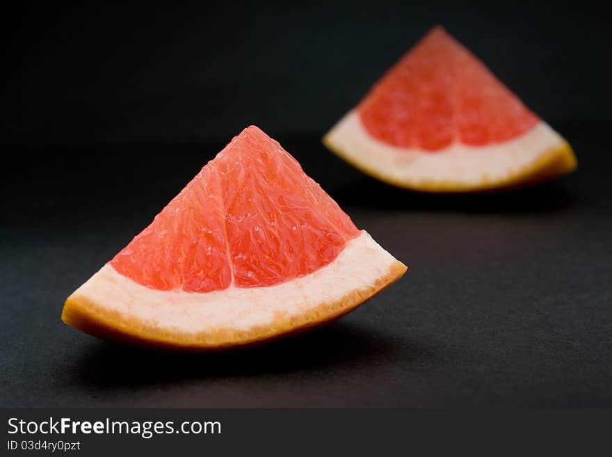 Slices of fresh delicious red grapefruit. Slices of fresh delicious red grapefruit