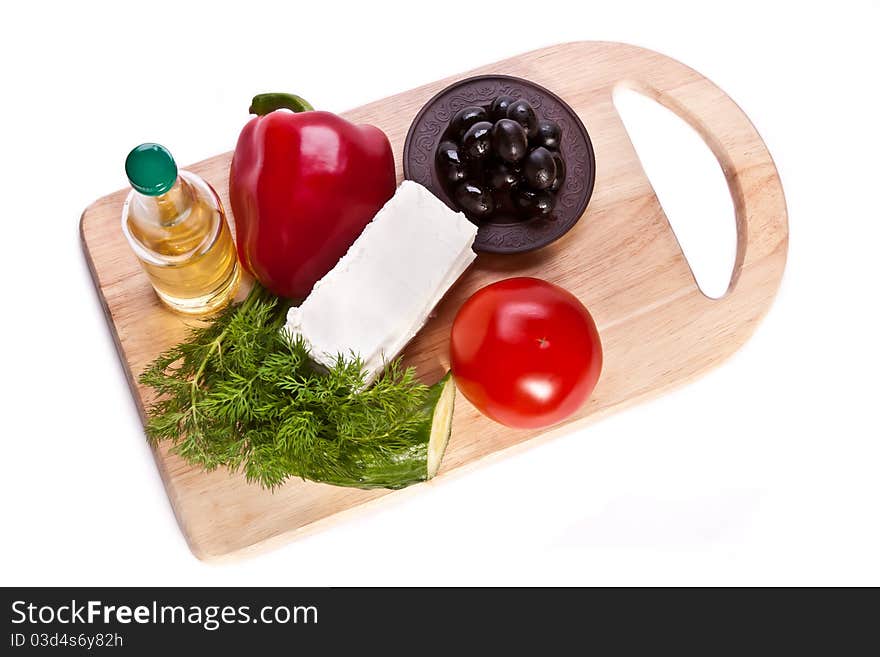 Vegetables for salad on the cutting board