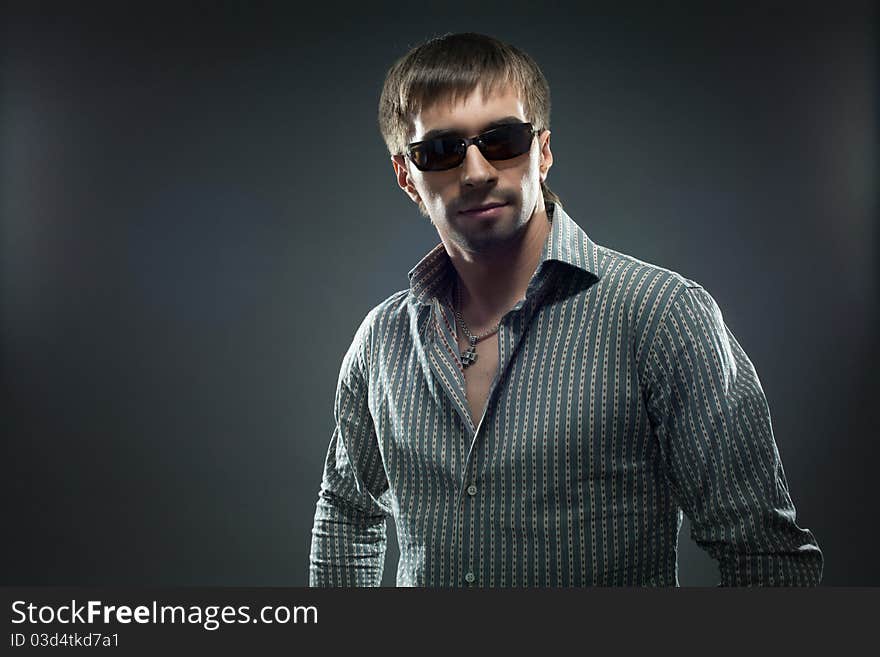 Portrait of handsome young man in sundglasses