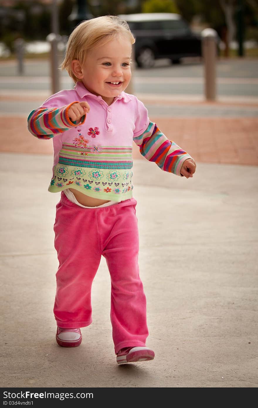 Happy infant enjoying being outside. Happy infant enjoying being outside