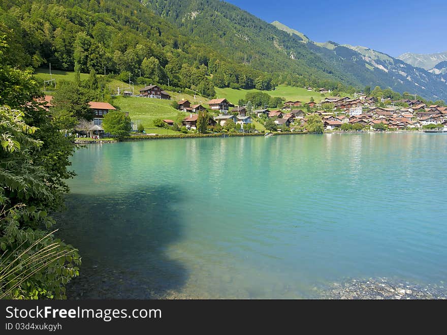 Looking across lake brienze (brienzersee) to the oberried shoreline. Looking across lake brienze (brienzersee) to the oberried shoreline.