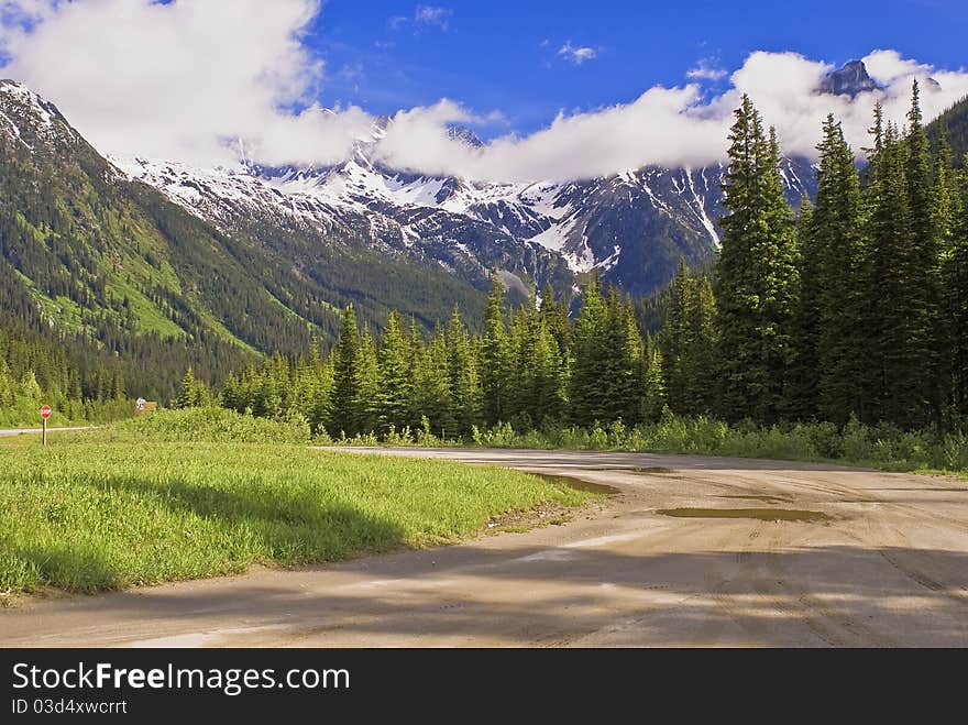 Cloud enshrouded mountains, at rogers pass, revelstoke national park.