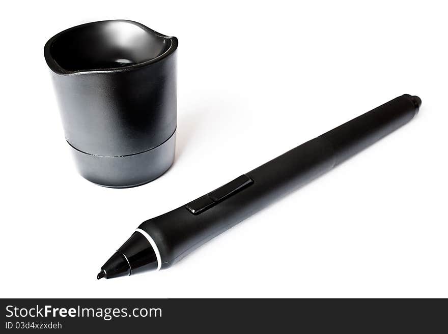 Closeup view of pen tablet accessories - a pen and a penholder