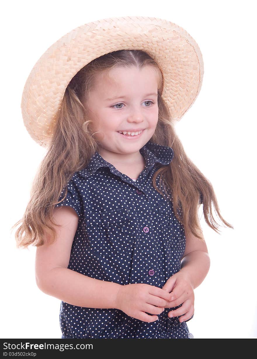 Attractive little girl with big straw hat