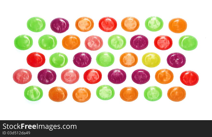 Assorted colorful candies isolated in white background