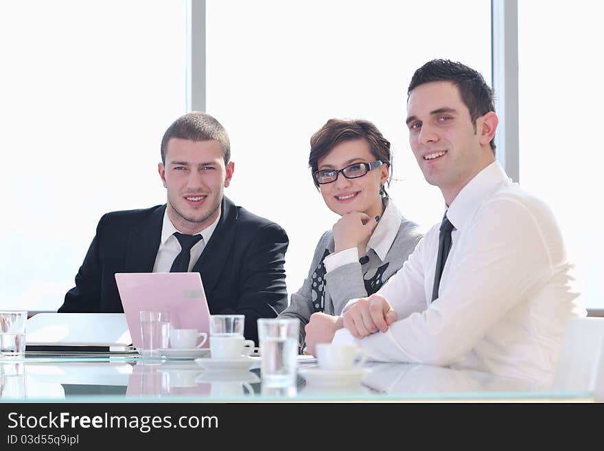 Group Of Business People At Meeting