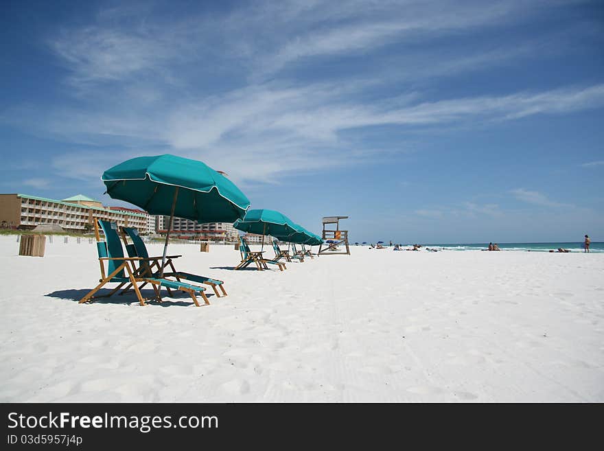 Beach chairs and a umbrellas. Beach chairs and a umbrellas.