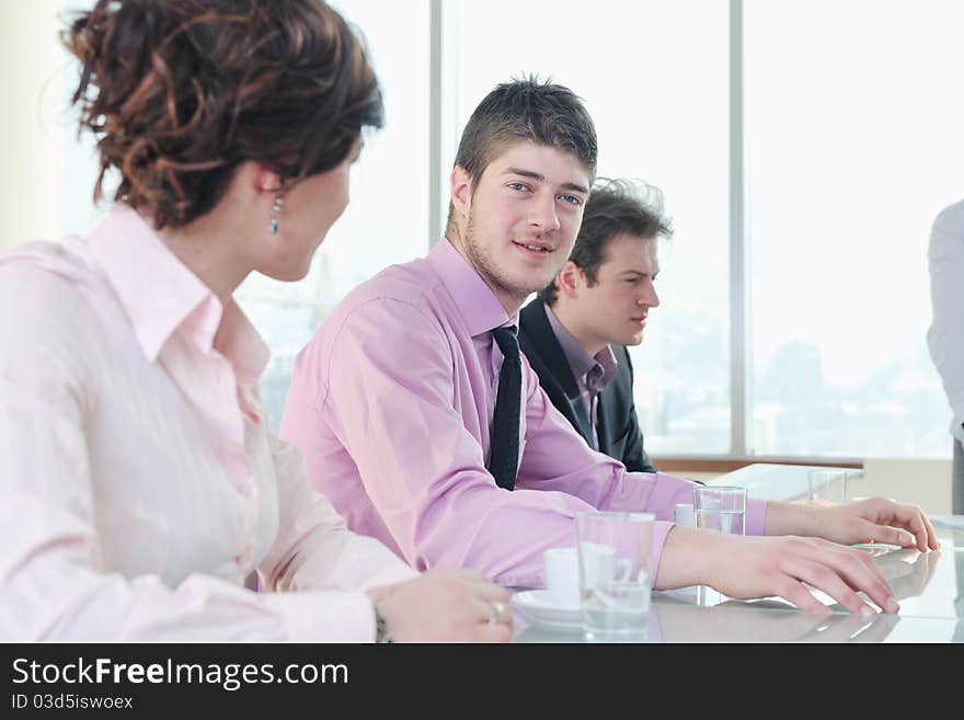 Group Of Business People At Meeting