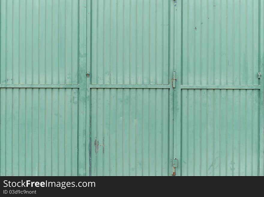 Green iron gate for a background