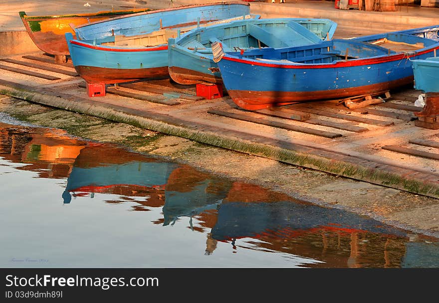 Boats on wharf on a sunny day