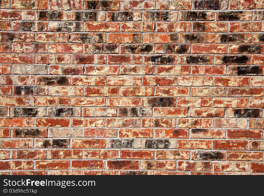 Image of a multi hued brick wall. Image of a multi hued brick wall