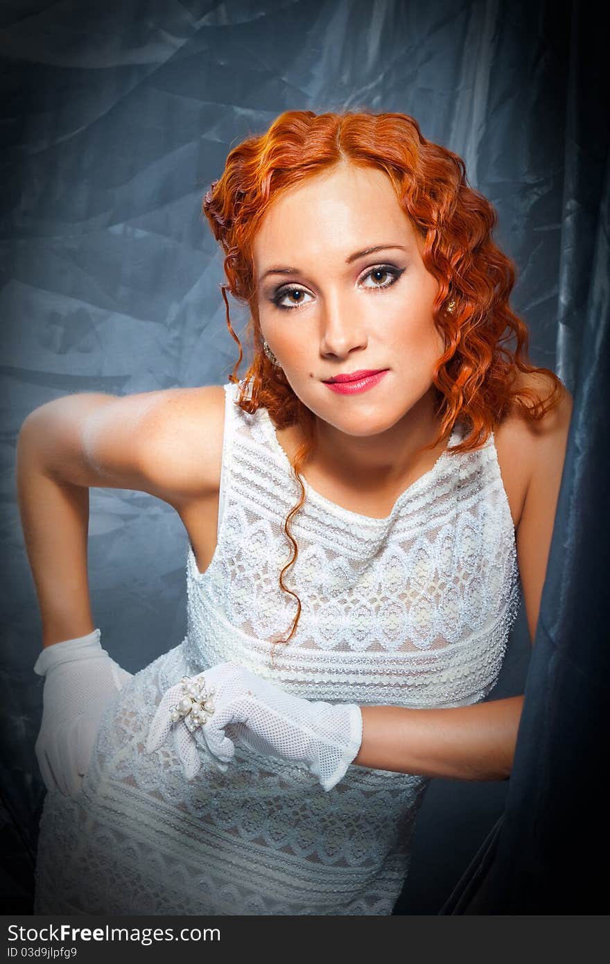 Girl With Red Hair Wearing White Dress And Gloves