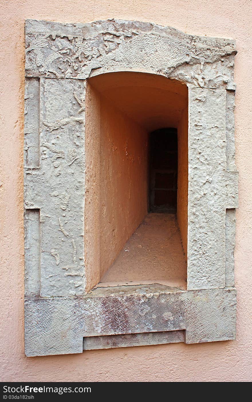 One old ,unusual and rare, window in a pink wall. One old ,unusual and rare, window in a pink wall