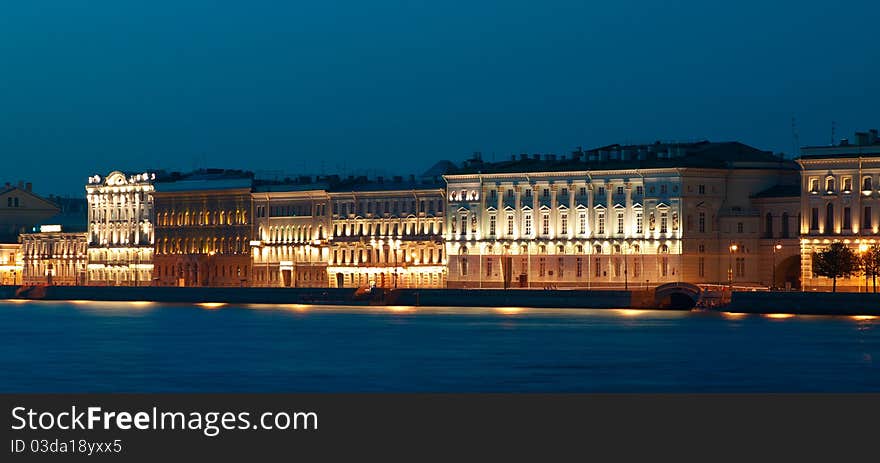 Night urban landscape with river. Saint-Petersburg, Russia