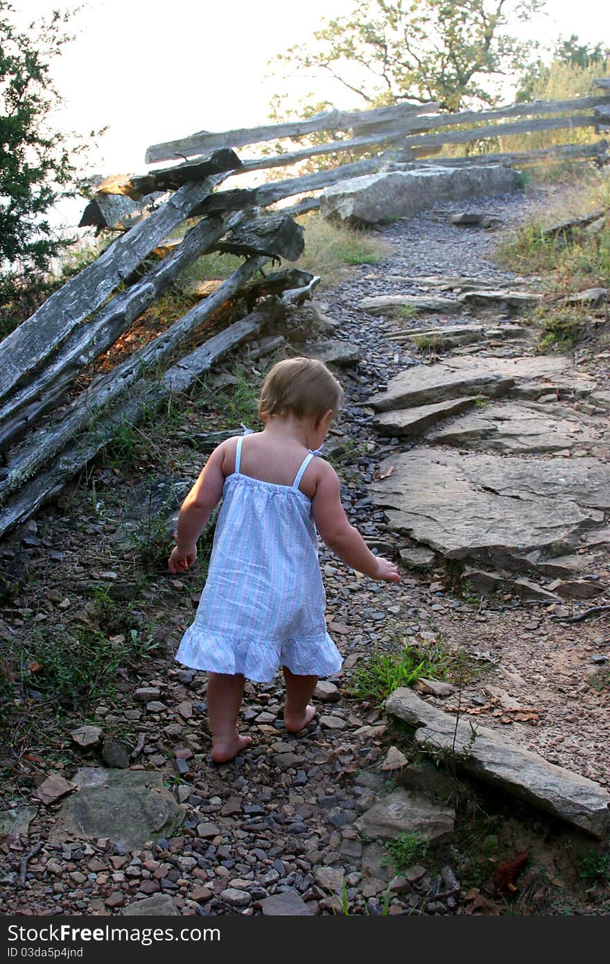 Child walking on a path. Child walking on a path