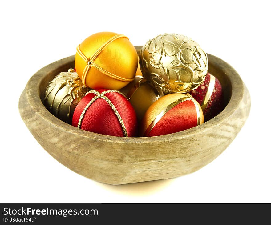 Easter eggs in a wooden bowl