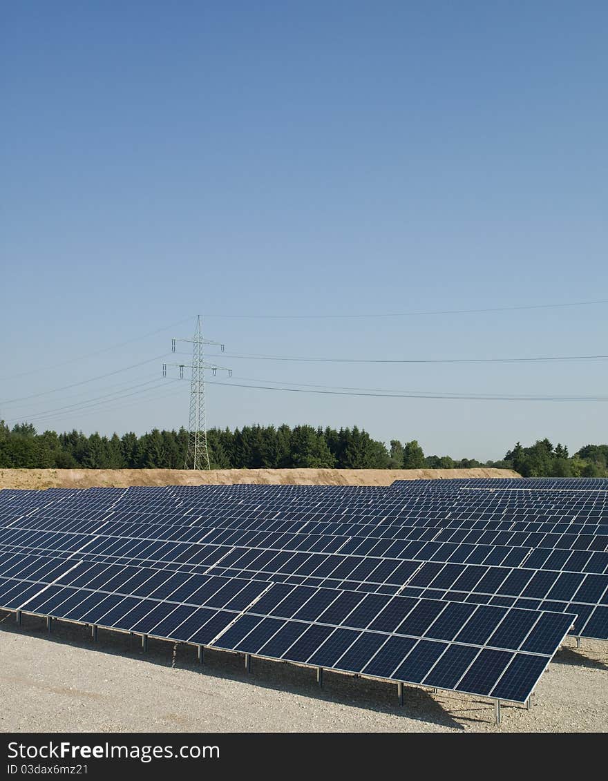 Solar panels and power pole, elevated view. Solar panels and power pole, elevated view