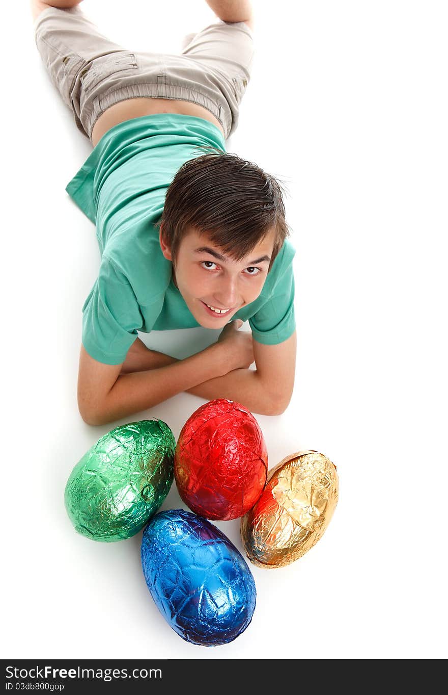 Boy with four large easter eggs