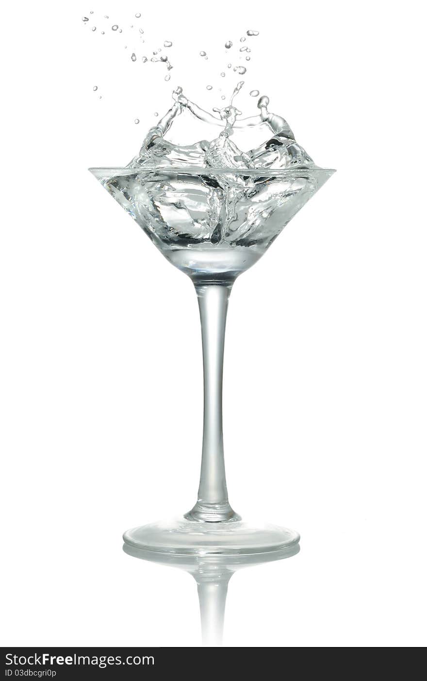 Ice cubes into the glass, drop water. Ice cubes into the glass, drop water