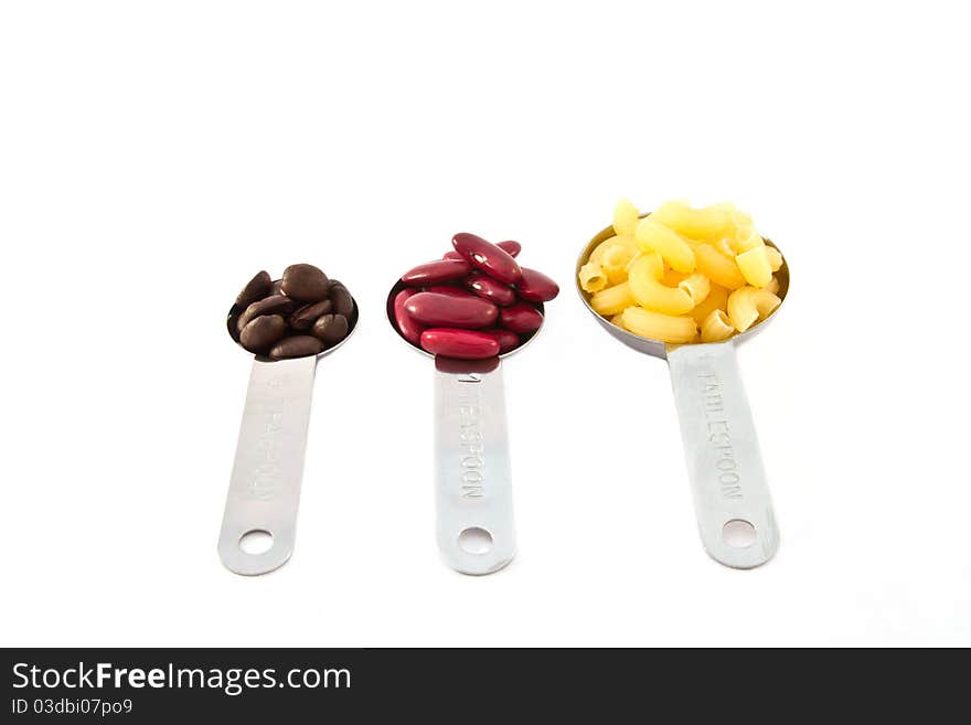 Coffee rad beans and macaroni, measure spoon