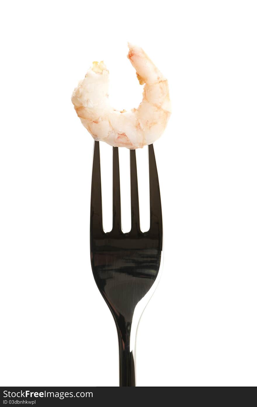 One shrimp on a fork ready to eat.