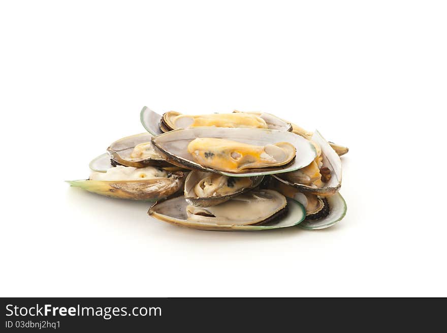 Cooked and prepared mussels ready to be eaten.