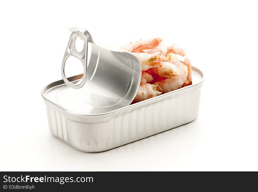 Opened tinned shrimps ready to be eaten.