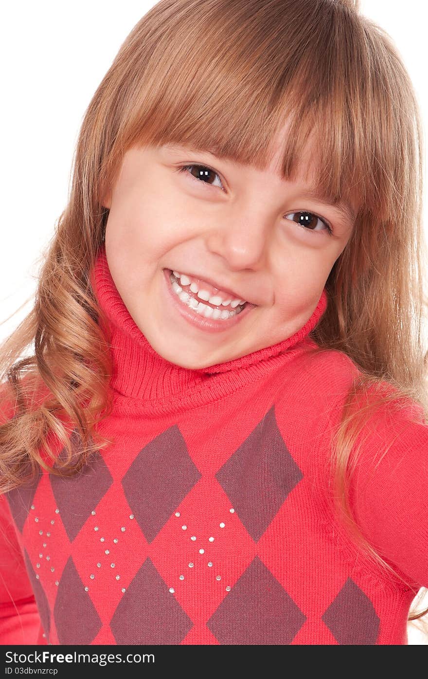 Portrait of a pretty little girl in sweater on white background