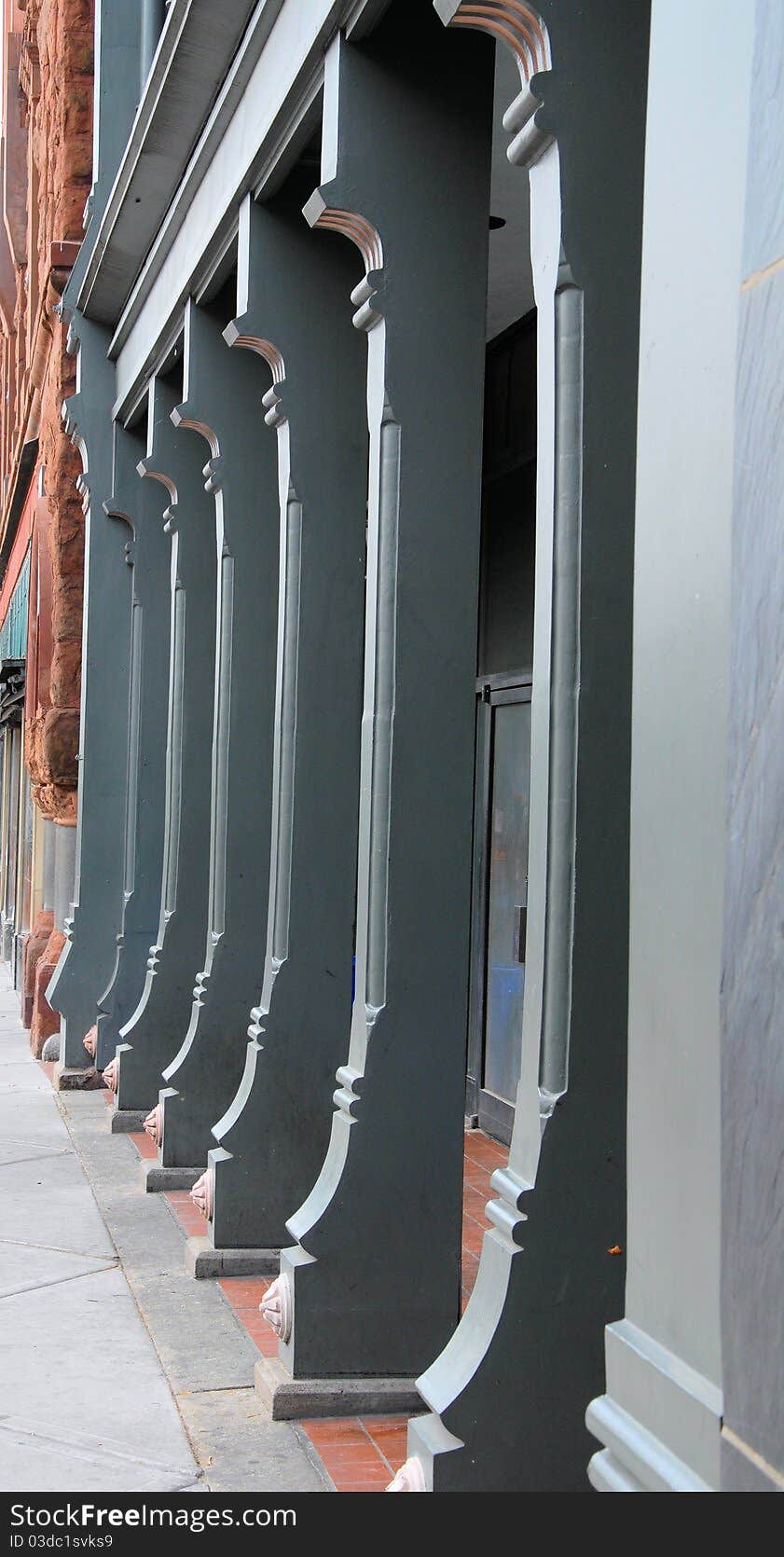 Closeup view of columns along a city street. Closeup view of columns along a city street