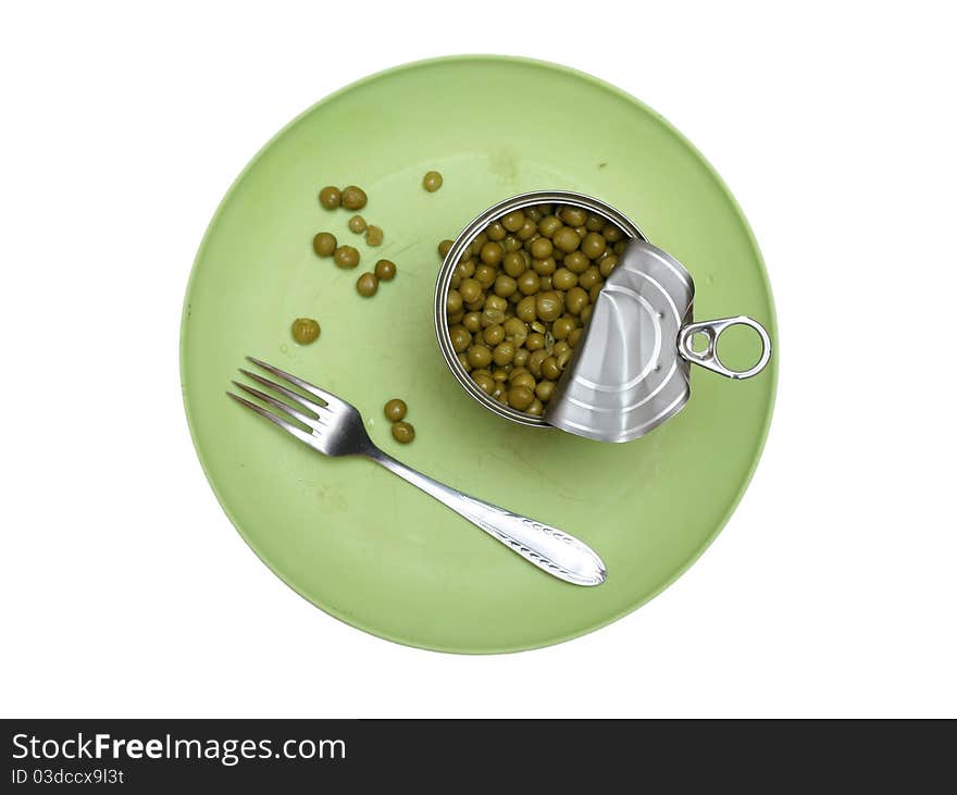 Green peas in a bowl with a fork and spoon