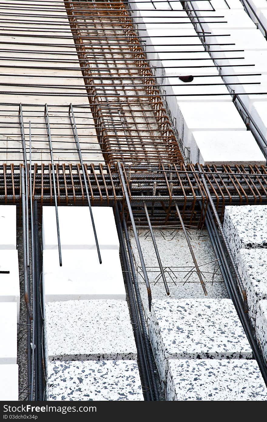 Technical detail of building operations: floor. Materials: polystyrene, steel bars, concrete. Technical detail of building operations: floor. Materials: polystyrene, steel bars, concrete