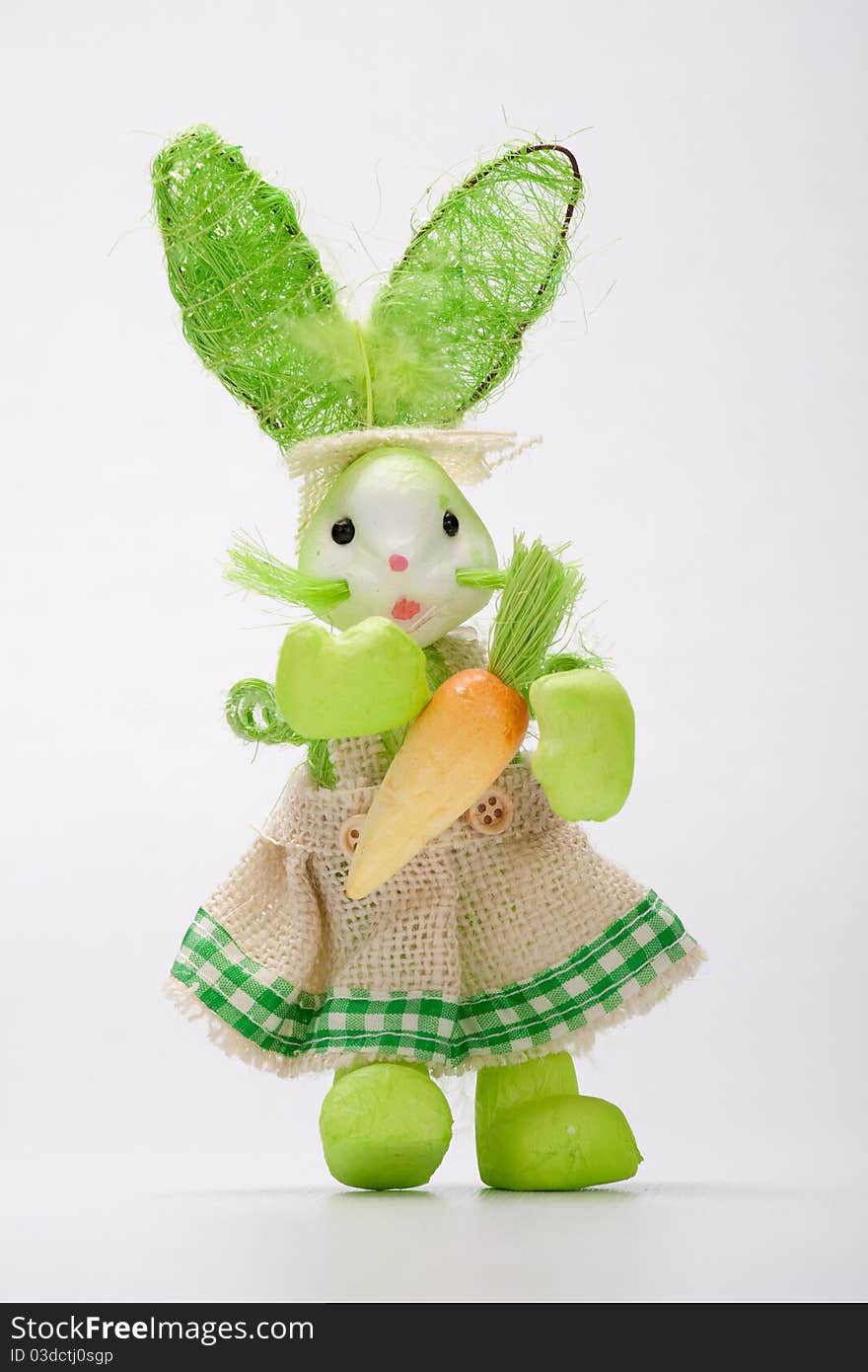 Green lady bunny posing with charm.