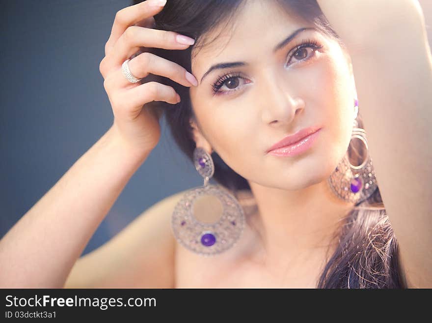 Beautiful lady with long brown hair. Portrait