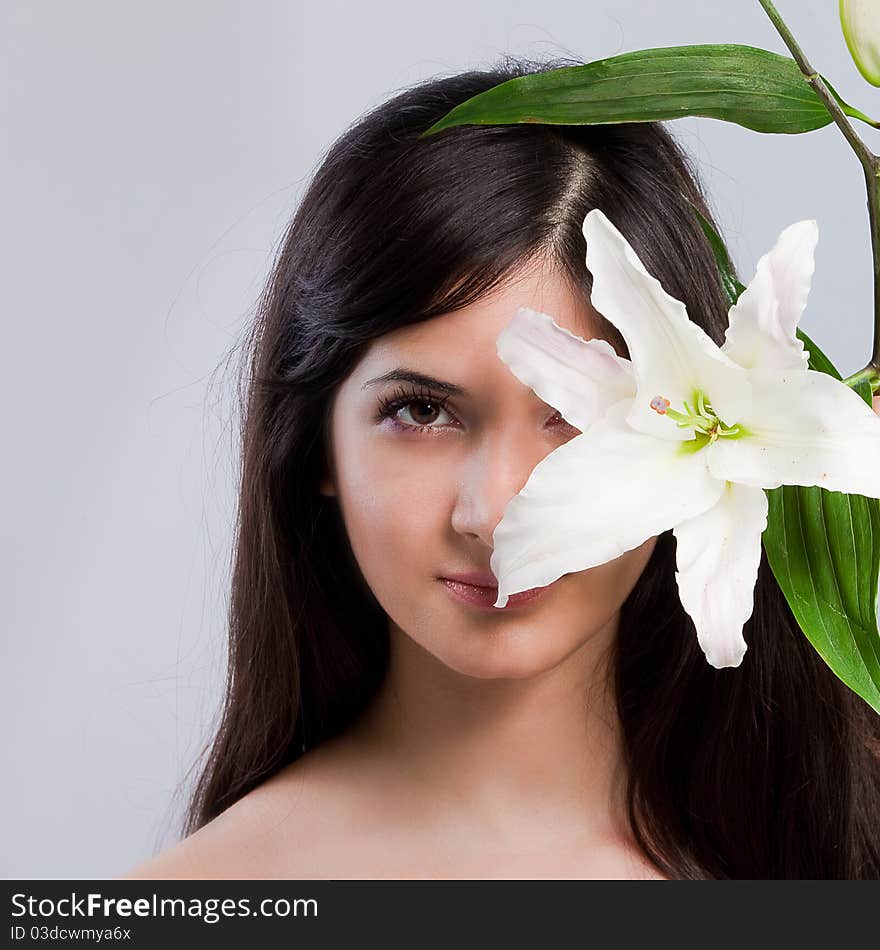 Beautiful woman with lily