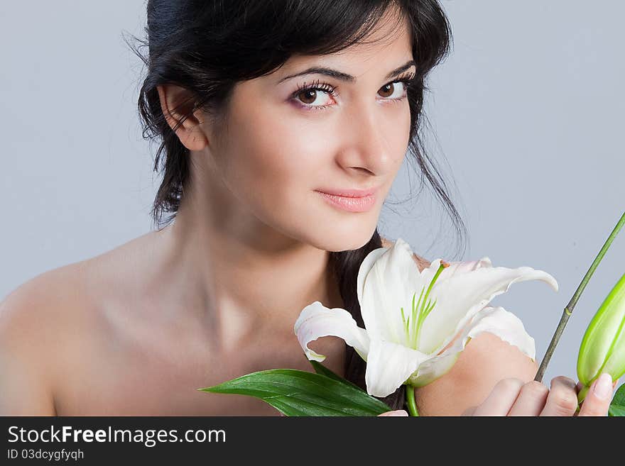 Beautiful woman with lily