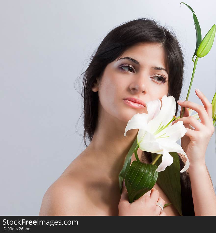 Beautiful woman with lily